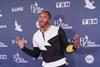 Nashville, Tennessee, USA, October 19, 2021. Hip Hop Artist LeCrae walk the Red Carpet during the 52nd Annual GMA Dove Awards at Allen Arena