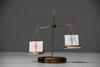 pp28_April2024_WAPlus_male-and-female-symbols-on-scales-on-wooden-table-2023-11-27-05-30-49