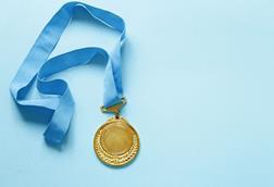 pp8-11_Aug2024_Profile_gold-medal-with-ribbon-2023-11-27-04-55-46-utc