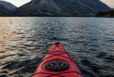 pp26_March2024_Spotlight_kayaking-in-glacier-lake-surrounded-by-the-canadia-2023-11-27-05-31-02-utc