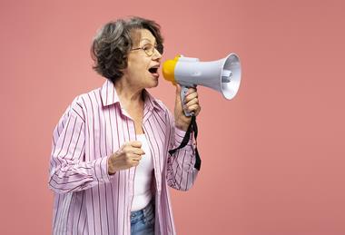 pp39_Nov2024_Menopause_senior-woman-wearing-holding-megaphone-talking-an-2024-01-08-22-59-34-utc