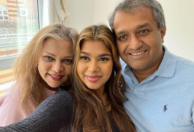 Image: Preethy with her daughter, Rhema, and husband Rakesh