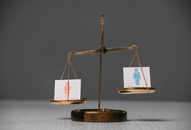 pp28_April2024_WAPlus_male-and-female-symbols-on-scales-on-wooden-table-2023-11-27-05-30-49