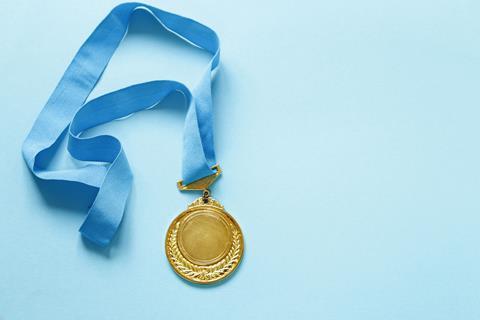 pp8-11_Aug2024_Profile_gold-medal-with-ribbon-2023-11-27-04-55-46-utc