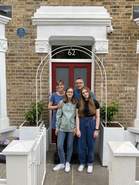 Jeannine and her family outside their homeNightstop